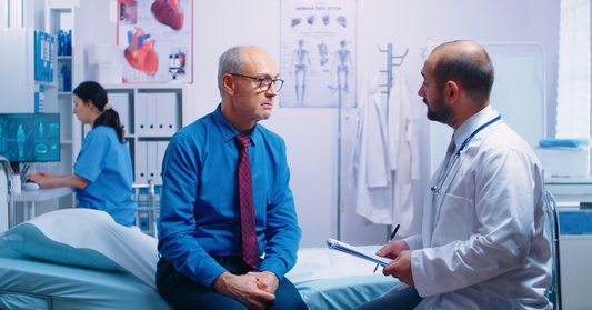 man and doctor talking in the hospital room