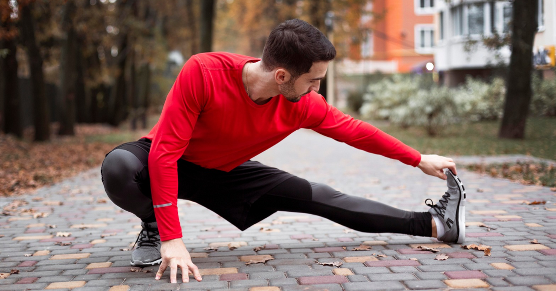 stretching man reaching his toes